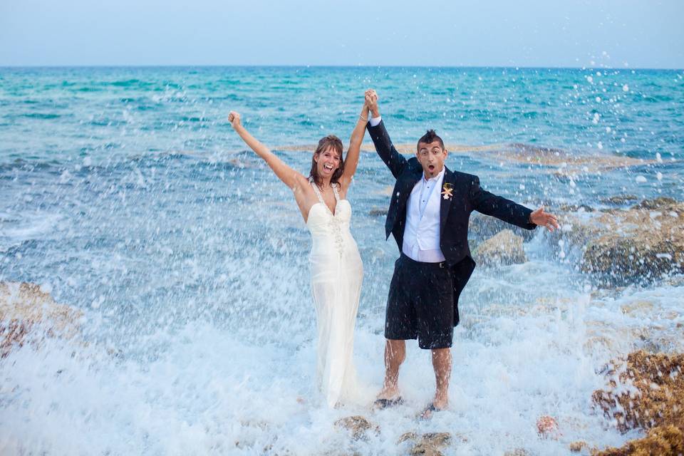 Newlyweds with the waves