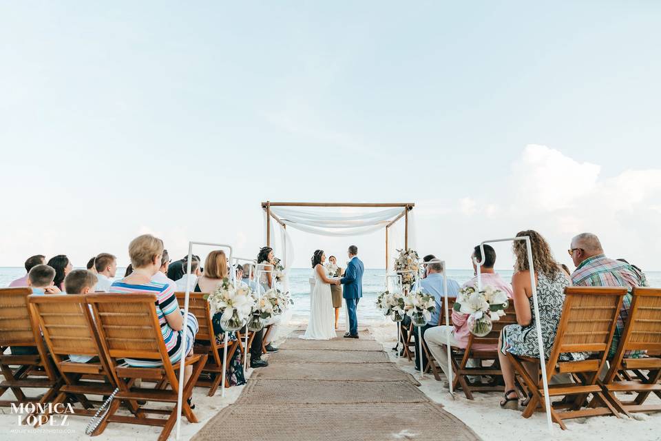 Beach wedding w/ rattan chairs