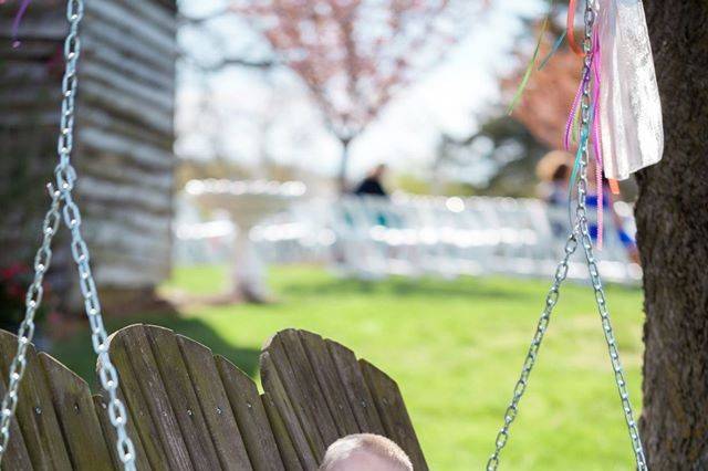 Ring bearer enjoying the swing