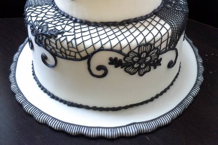 Gluten free fondant wedding cake with black lace and red gumpaste roses