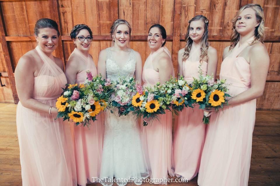 Ladies holding bouquets