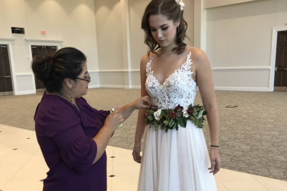 Assisting the bride