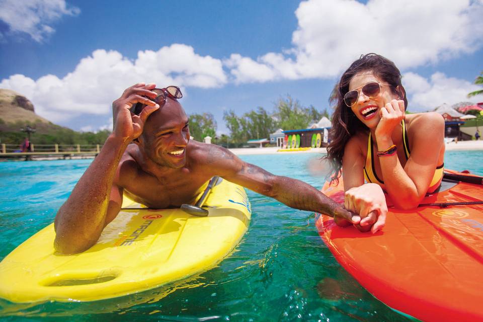 Newlyweds on paddle boards