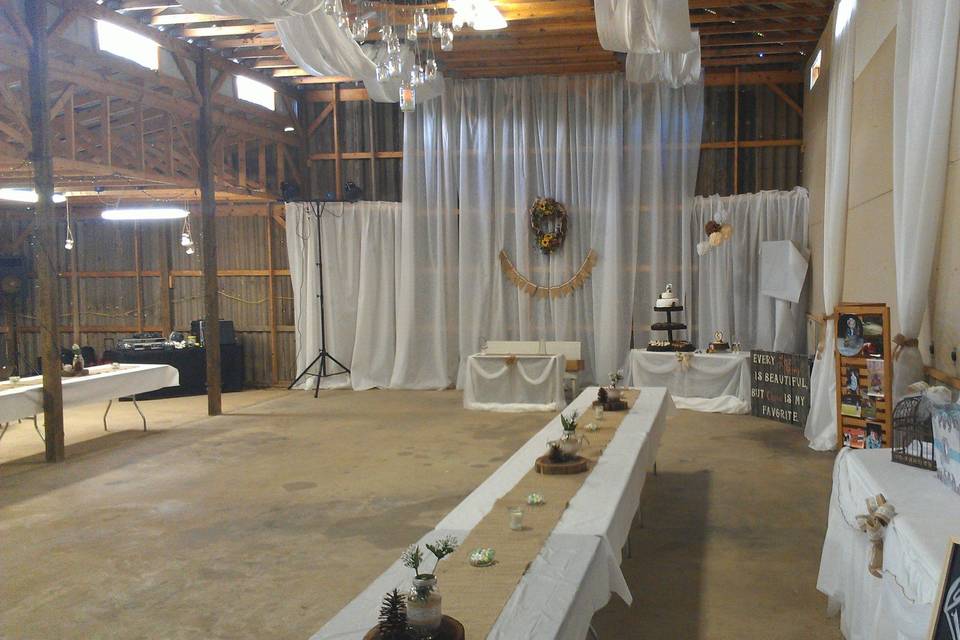 Another barn wedding reception, You can see some of our gear in the back left corner.The ceremony was right outside in a pretty field setting. Check for that photo right after this one!