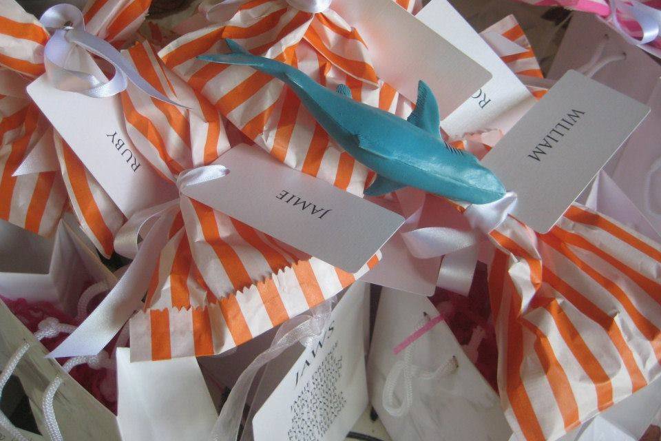 Candy Stripe bags with beach theme as place settings