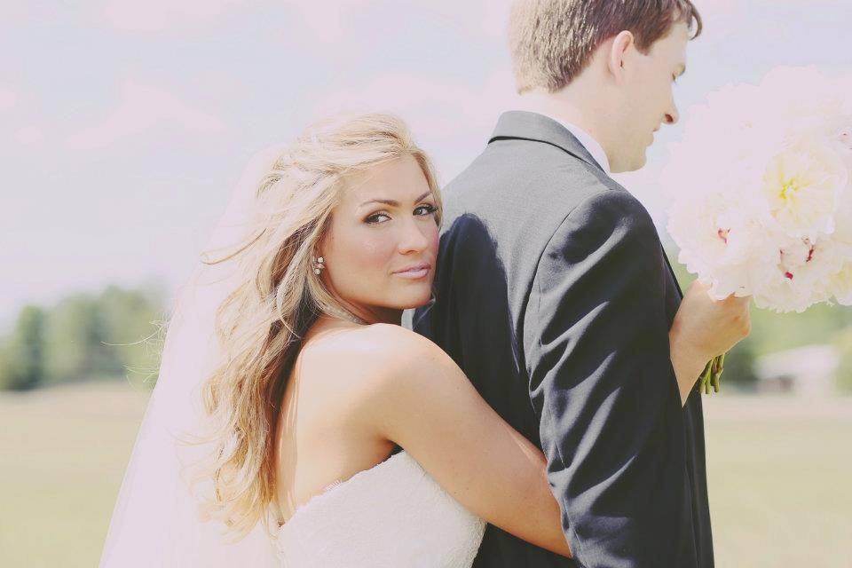 Bride embracing her groom