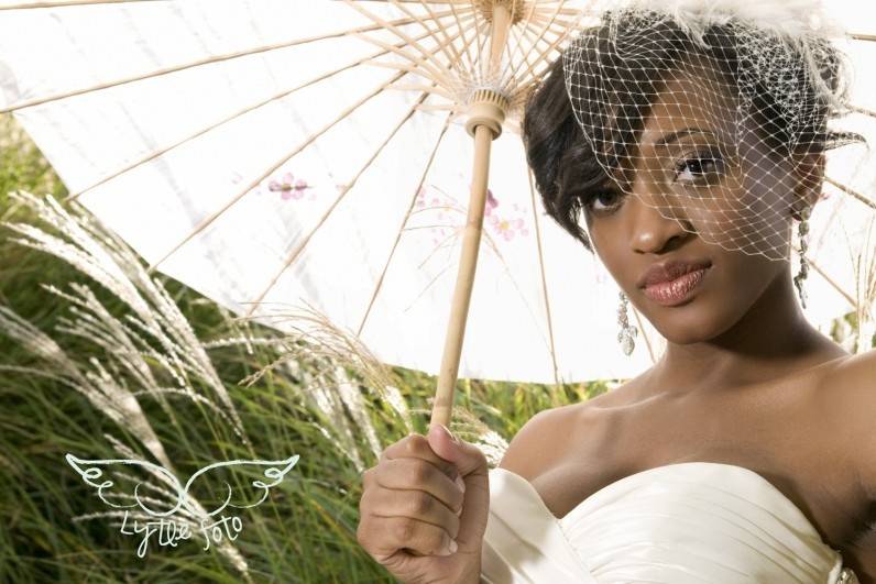 Bride under her parasol