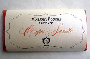 Maison Bouche Crepes Suzette Bars - Imagine the unctuousness of orange-zested chocolate, with a splash of Grand Marnier, and crunchy, buttery, crepe cookies, and you get the idea. Your tastebuds provide the flame.