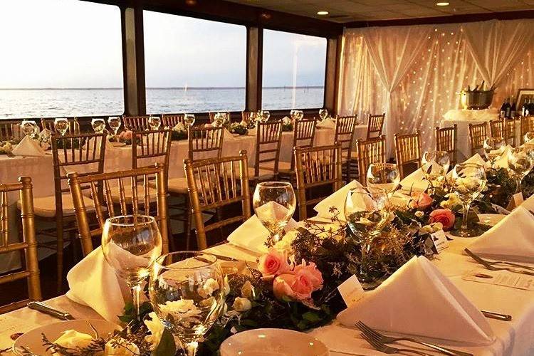 Classic and romantic design for this yacht wedding and reception for the SOLARIS Yacht Sandestin Florida, created by in-house wedding planners