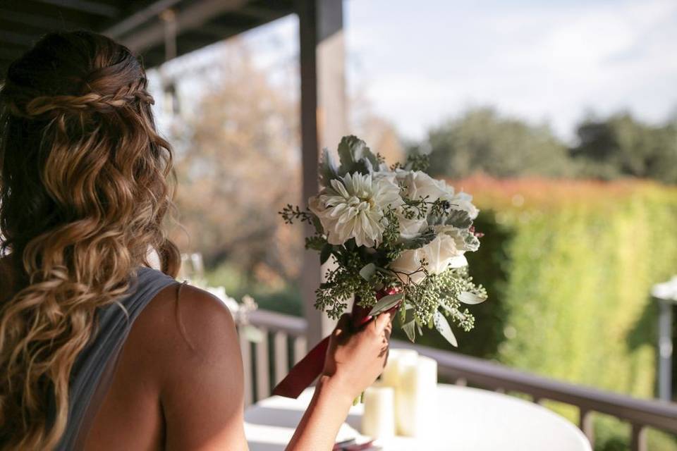 Our beautiful bride with her lovely bridesmaids.  Bridal bouquet designed with fuchsia garden roses, dahlias, anemones, purple hydrangea and purple dendrobium orchids.  Bridesmaids designed with white and lavender roses with fuchsia stock.