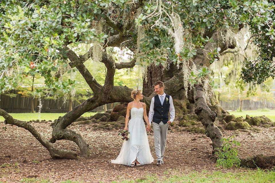 Bride and groom holding hands