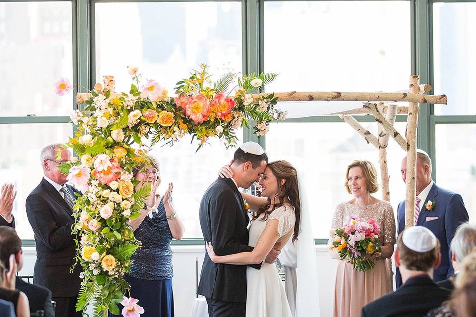 Bride and groom kiss