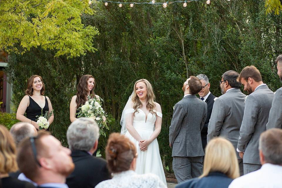 Bride laughing during ceremony