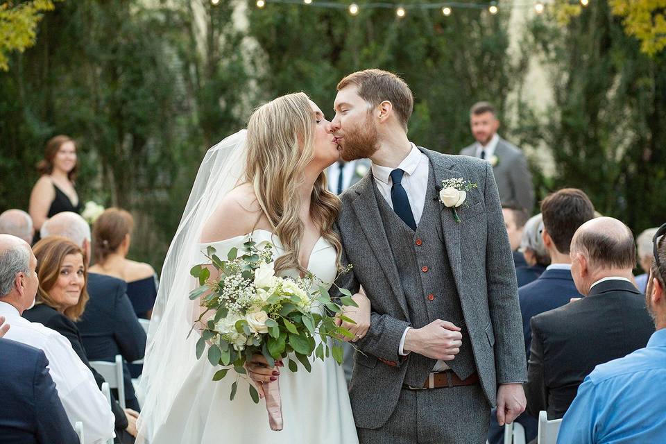 Bride and groom kissing