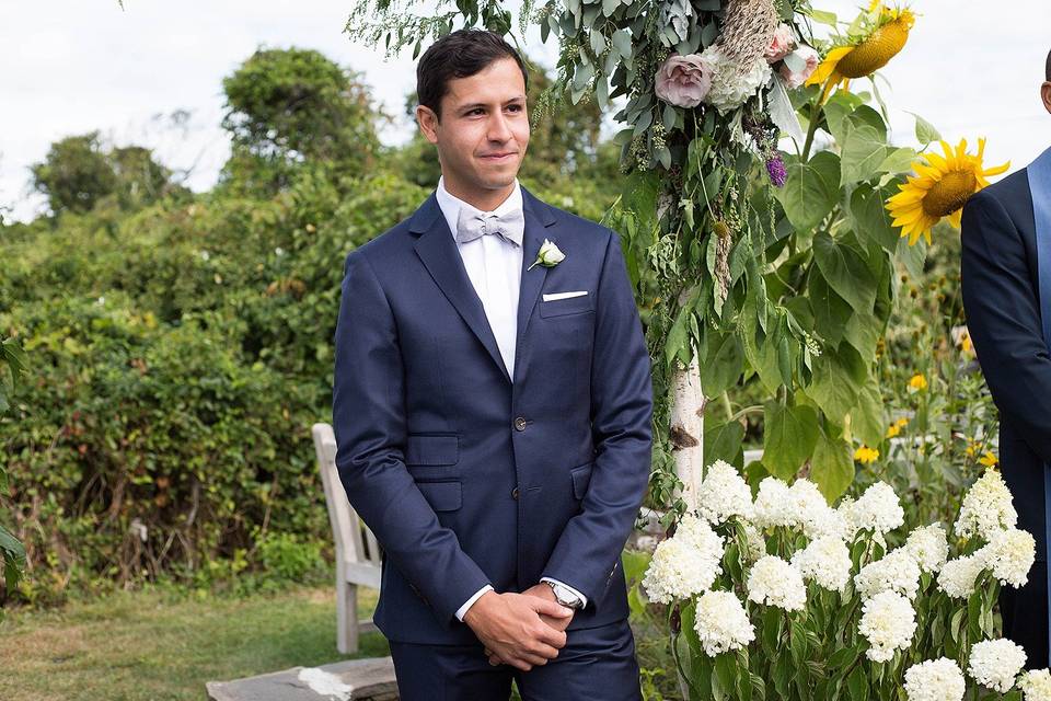 Groom looking at bride