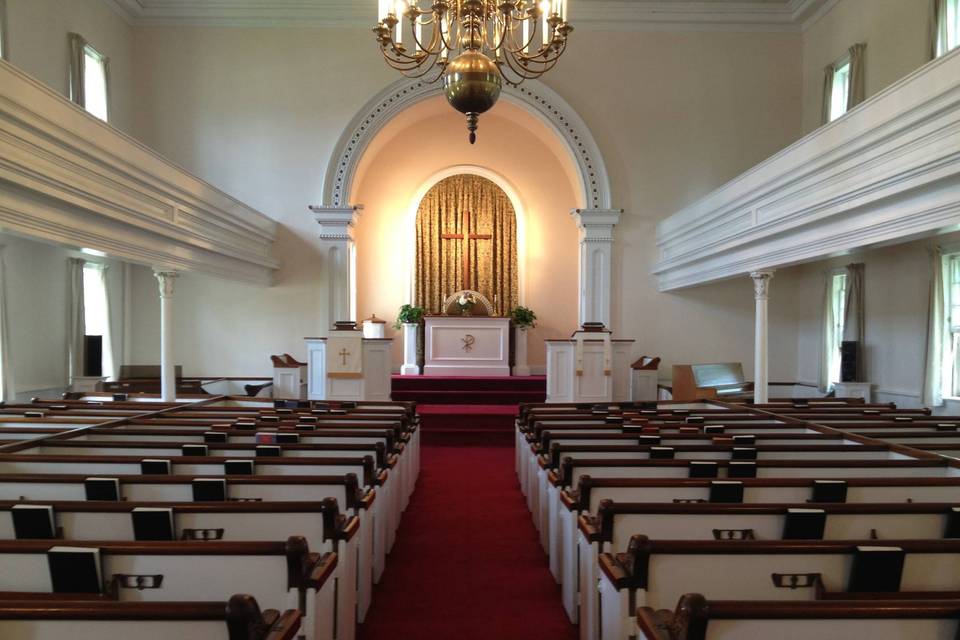 Indoor wedding ceremony setting