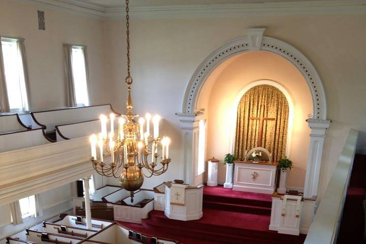 Indoor wedding ceremony setting