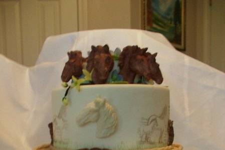 Horse Themed cake with fondant impressions, molded fondant decorations and gumpaste flowers