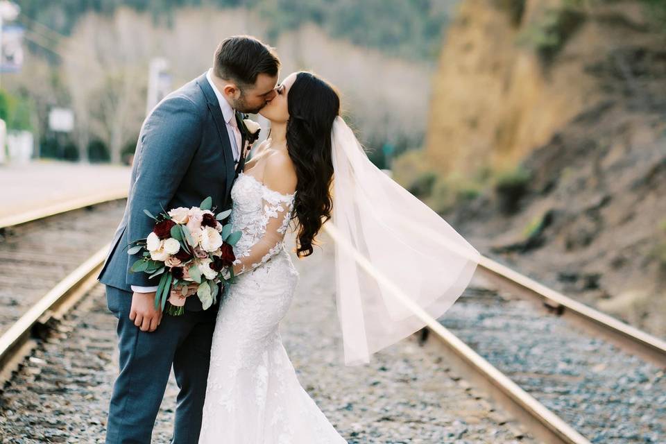 Couple with burgundy florals