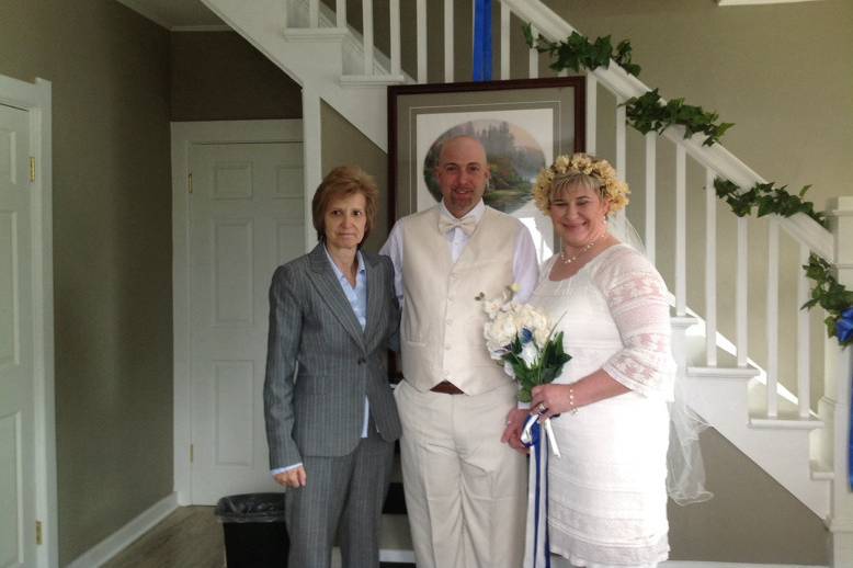 Pastor Deb Helton with the newlyweds