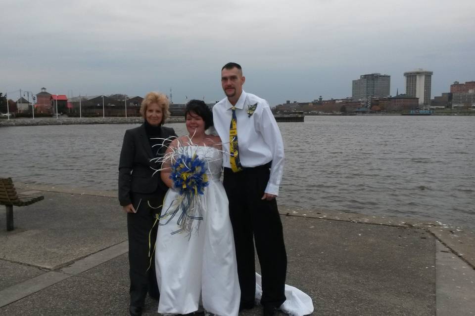 Pastor Deb Helton with the newlyweds