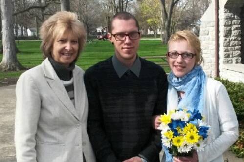 Pastor Deb Helton posing with the guests