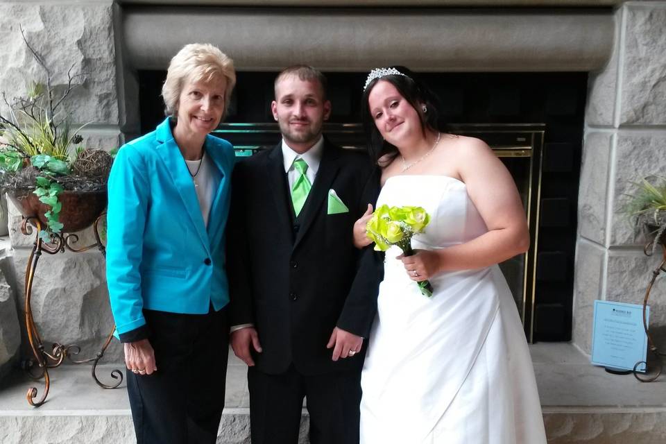 Pastor Deb Helton with the newlyweds