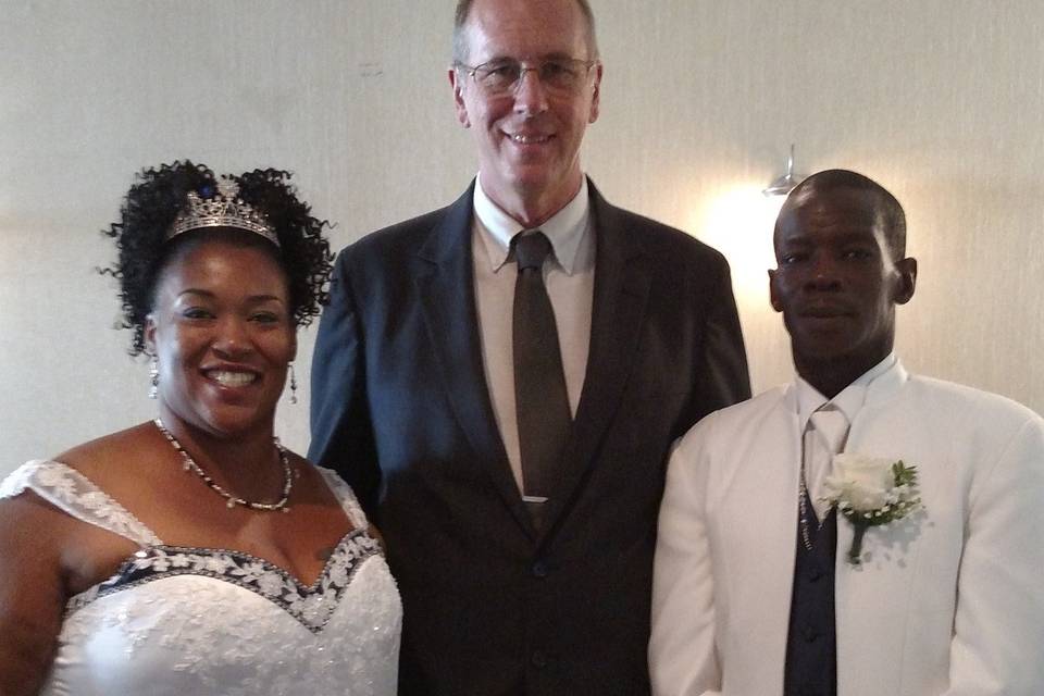 Newlyweds and the officiant