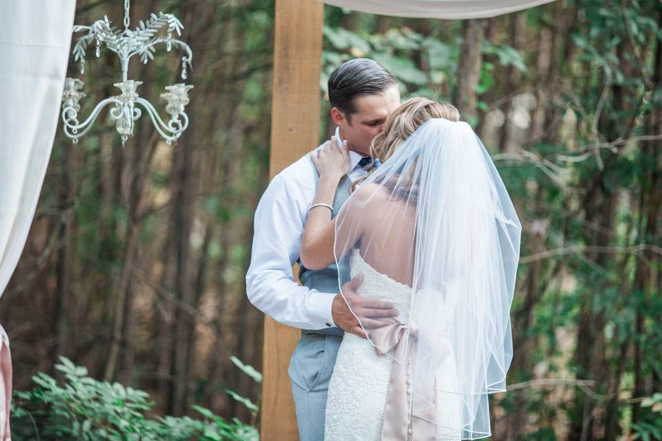 Couple in arbor area