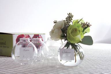 these mini vases act as a favor, place card holder & NO centerpiece is needed