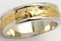 Lady's 14 carat two-tone Claddagh and Celtic knot wedding band with yellow gold center and white gold trim. Affectionately known as the 