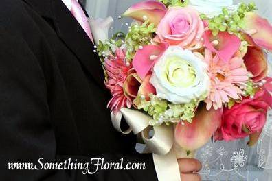 Contemporary, hand-tied bridesmaid bouquet with Asian flair. Designed by Something Floral.