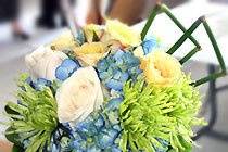 Contemporary, tropical-look, hand-tied fresh floral bouquet in vibrant colors, designed by Something Floral.