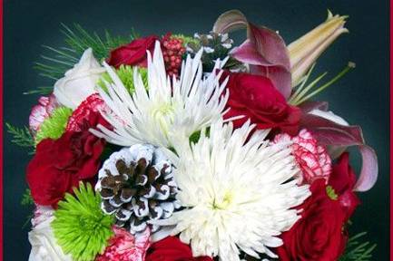 Winter teardrop, cascade bridal bouquet of fresh flowers with pinecones designed by Something Floral.