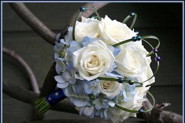 Contemporary hydrangea and rose bridal bouquet designed by Something Floral.