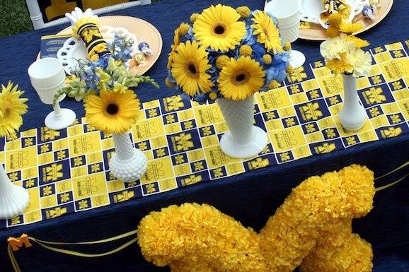 University of Michigan, football themed tablescape and fresh and artificial/silk centerpieces designed by Something Floral.