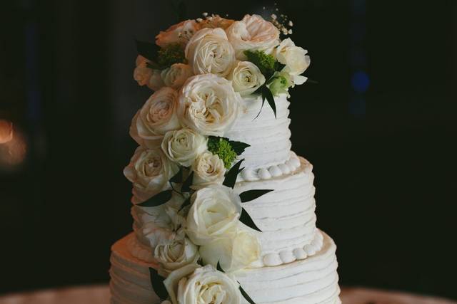 White wedding cake with white flowers