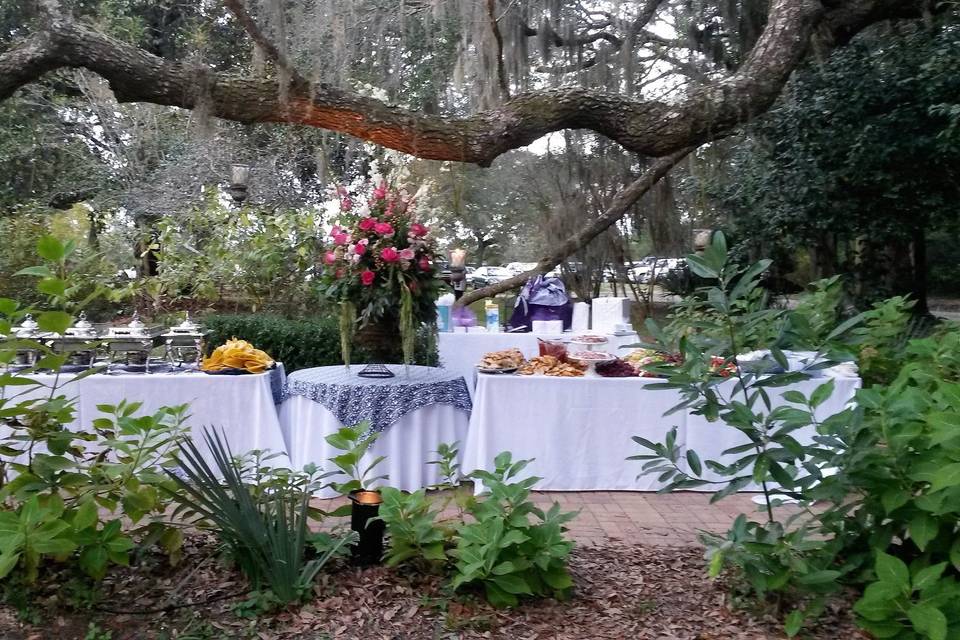 Beautiful buffet table on front walkway under 120 year old Live Oak trees.  #SweetSouthernScratch