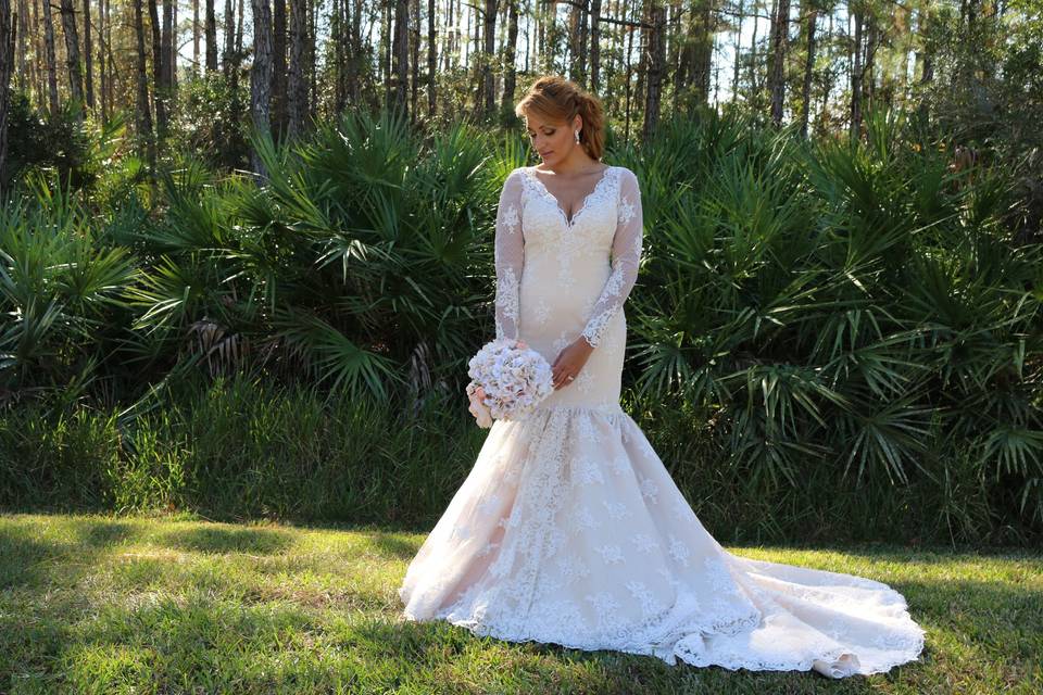 Two pieces wedding dress, lace knee length skirt with a beautiful long sleeves jacket.