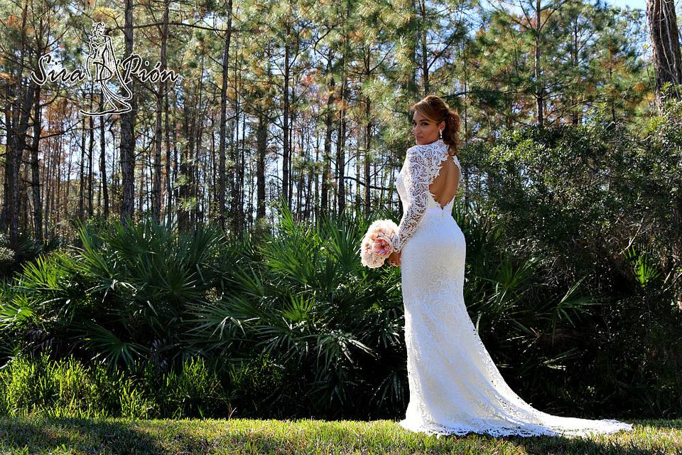 Beautiful knee length long sleeves lace wedding dress.