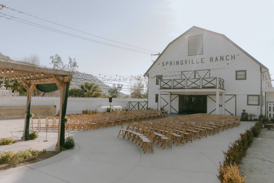 Ceremony in front of the barn