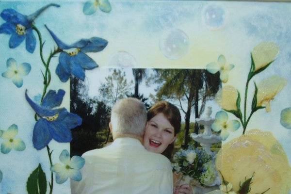 The 8x8 photo/flower canvas was an additional gift from the husband showing the bride with her grandfather.