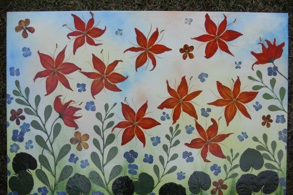 24 x 36 canvas with orange star gazers, orange orchids, blue hydranges and leaves