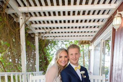 Couple on bench at the porch