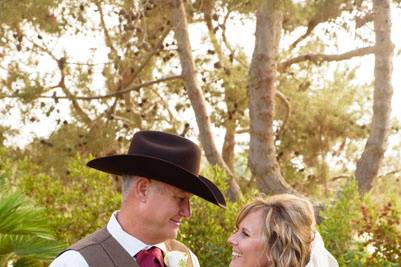 Groom wearing cowboy hat