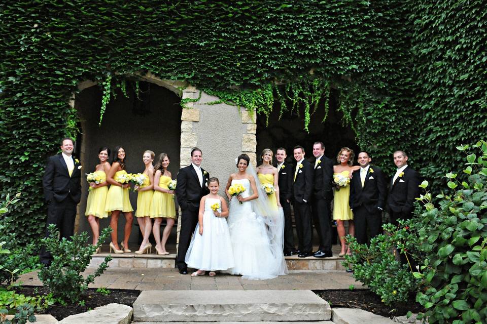 The couple with the bridesmaids and groomsmen