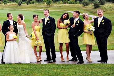 The couple with the bridesmaids and groomsmen