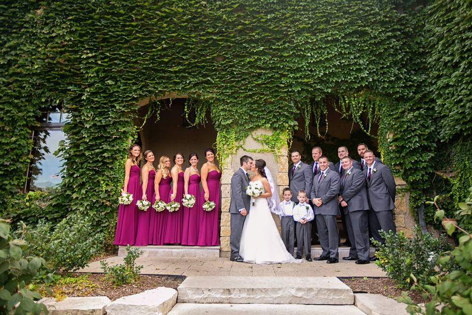 The couple with the bridesmaids and groomsmen