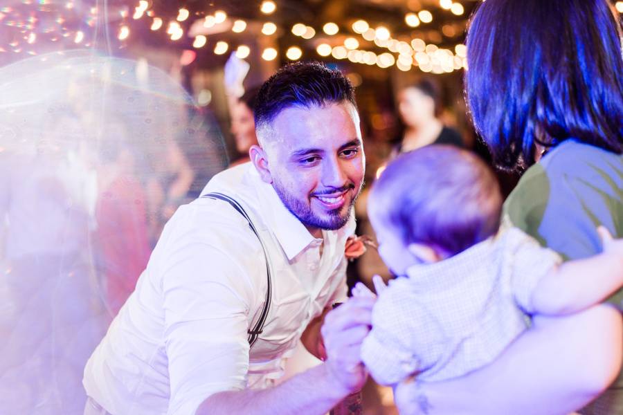 Groom dancing with Babies