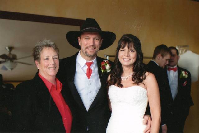 Leslie with happy newlyweds